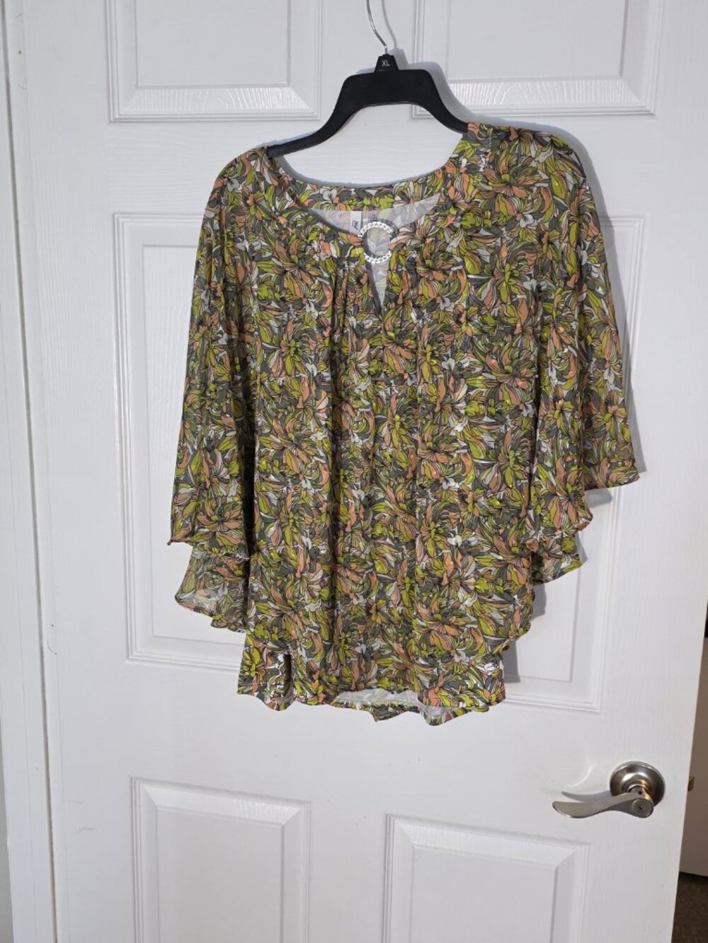 NY Collection Plus Size 1X Chiffon Poncho Top with Ring This overlay top from NY